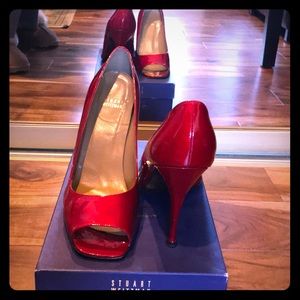 Stuart Weitzman “Linda” pump. Color: Red Quasar